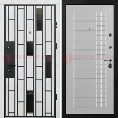 Белая с черными элементами железная дверь МДФ ДМ-282 в Котельниках