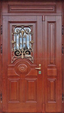 Филенчатая железная дверь со стеклом и ковкой ДСК-204 в Выборге