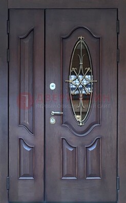 Темная металлическая дверь Винорит со стеклом и ковкой ДСК-239 в Котельниках