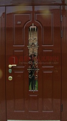 Красивая металлическая дверь со стеклом и ковкой ДСК-33 в Смоленске