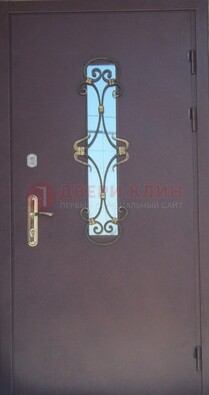 Металлическая дверь со стеклом и ковкой ДСК-77 в панельный дом в Воскресенске